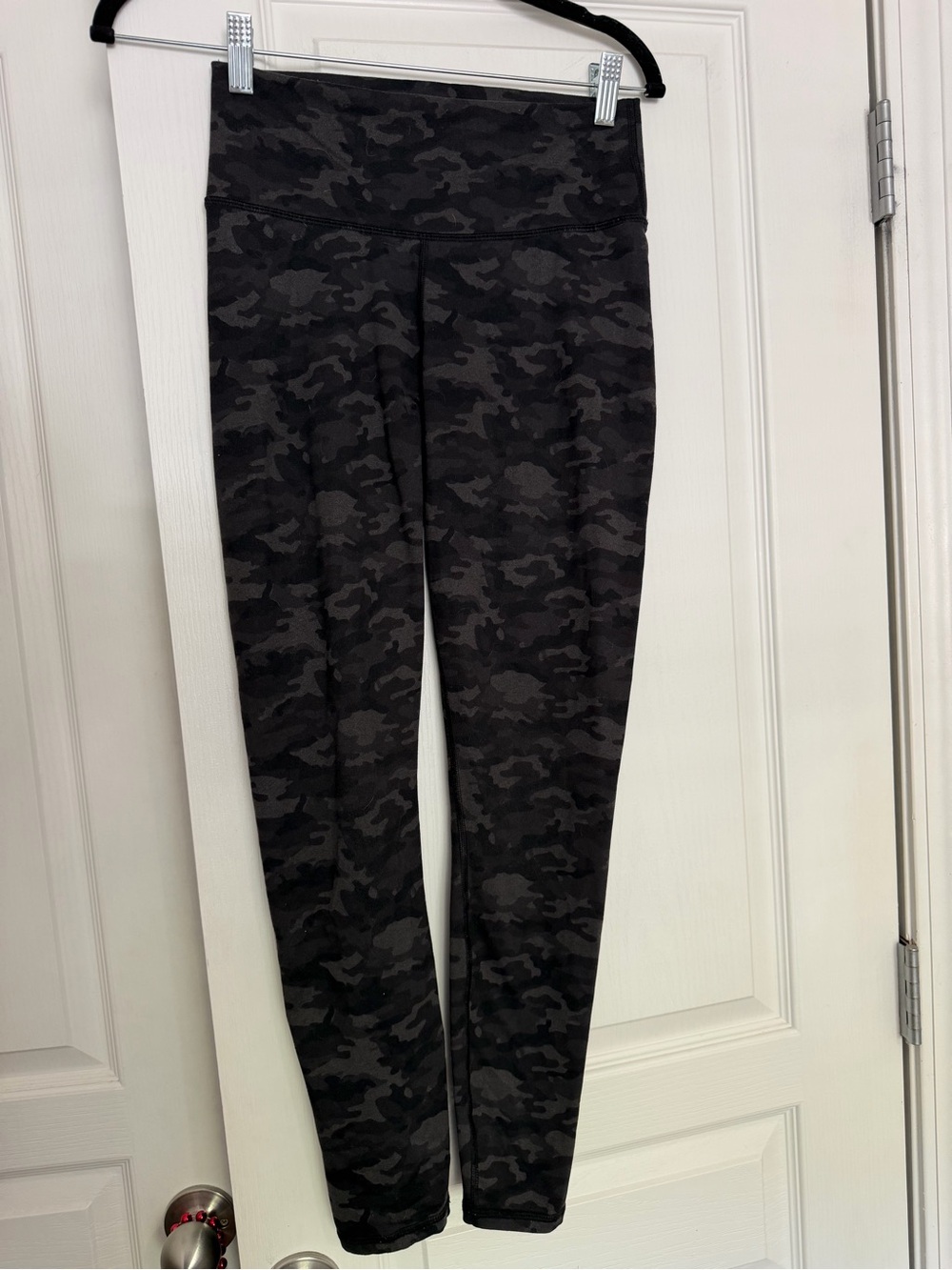 Fabletics black camoflauge leggings, size S.